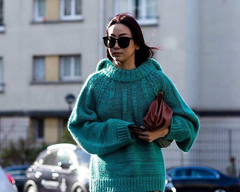What makes knitwear ideal for travel?